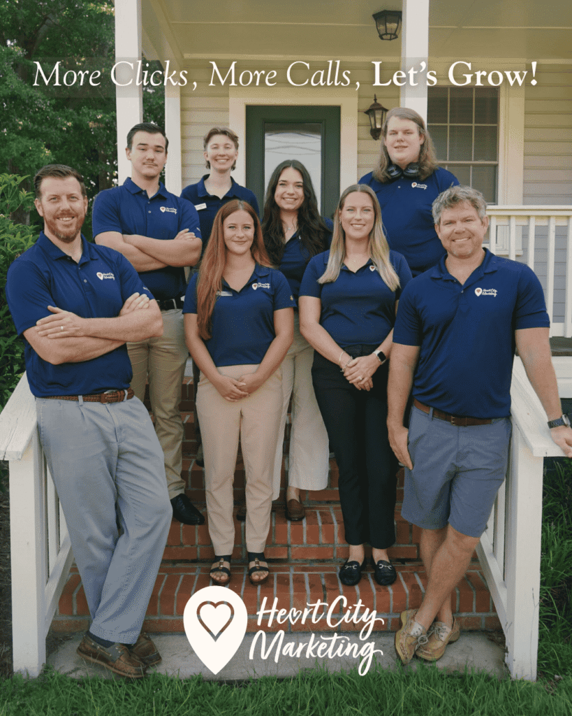 Heart City Marketing's local SEO team posing on steps in front of their office in Perry, GA